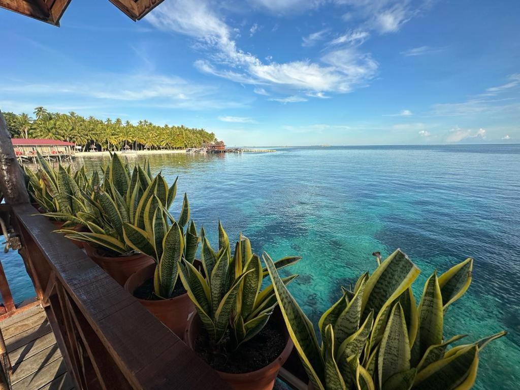 Ferienwohnung Mabul Backpackers Mabul Island Exterior foto